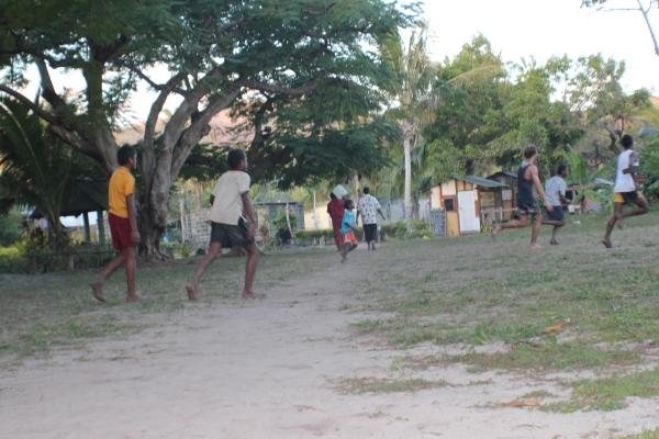 Playing Fijian touch-rugby with the local kids on Mana Island.